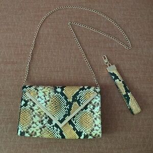 Aldo 3 way,snake print bag. Shoulder,wristlet,clutch.